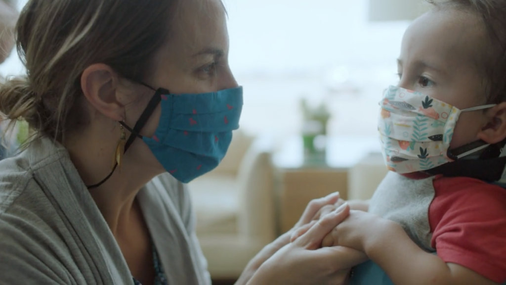 Boy with his Mom after PALS medical transport to critical care